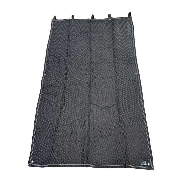 Sound Blanky sound blanket laid flat, showing hanging loops, grommets and chevron quilting