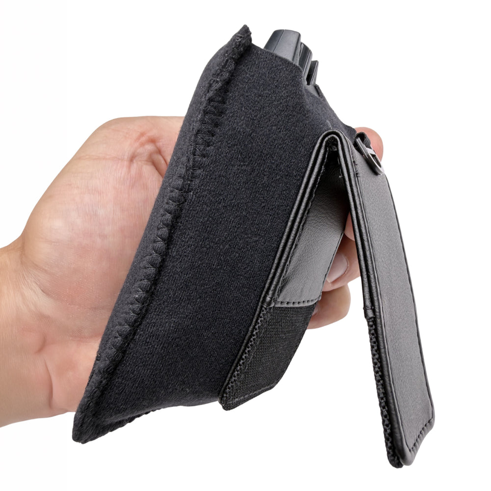 Side view of the Viviana magnetic pouch held in hand, showing the leather-backed magnetic clip open
