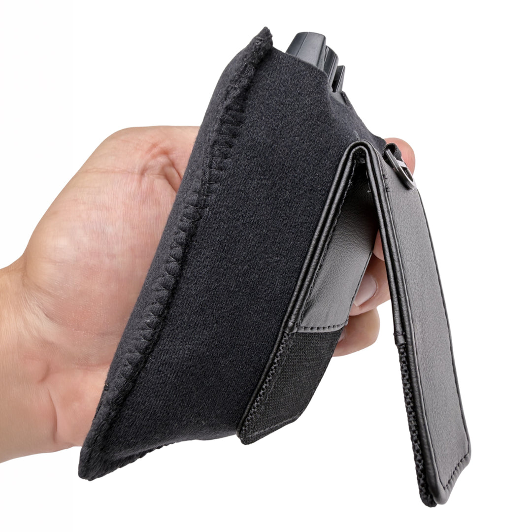 Side view of the Viviana magnetic pouch held in hand, showing the leather-backed magnetic clip open